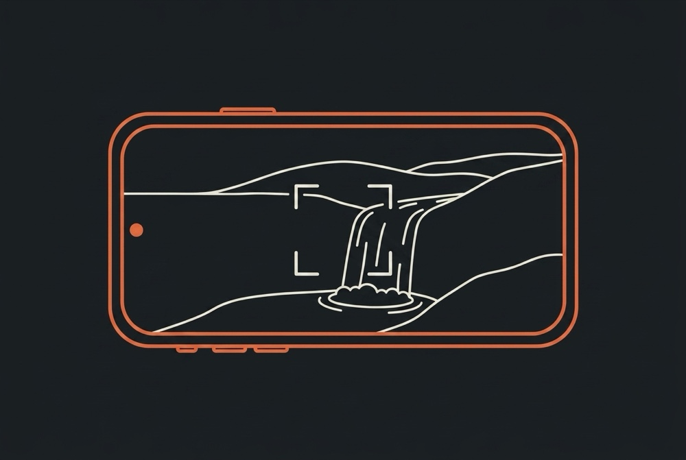 Line drawing of the phone showing a waterfall in live view with a focus bracket over it